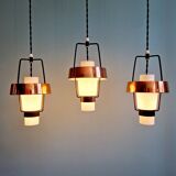 Trio of Scandinavian pendant lights in opaline and copper metal, 1960s