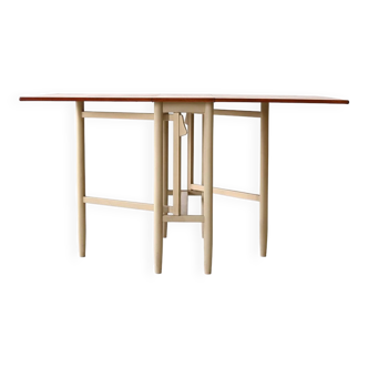 Vintage table with folding wings