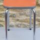 Orange formica stool