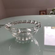 Four vintage clear glass bowls.