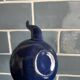 Mini blue enamelled sheet metal teapot