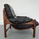 Fauteuil en teck et cuir années 1960