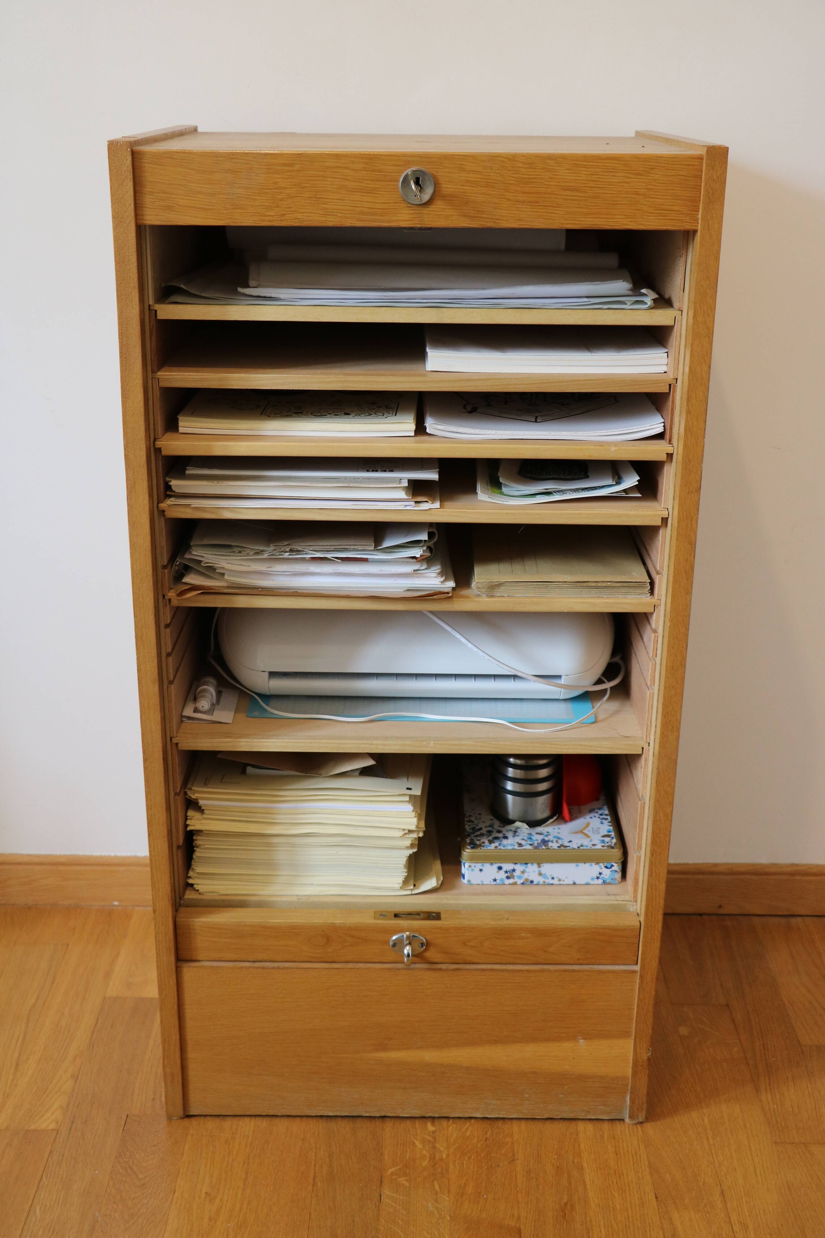 Filing cabinet with curtain