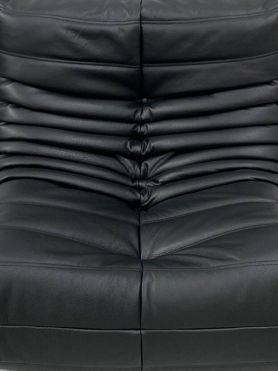 Set of French Togo lounge chair and ottoman in black leather attributed to Michel Ducaroy for Ligne Roset, 1970s