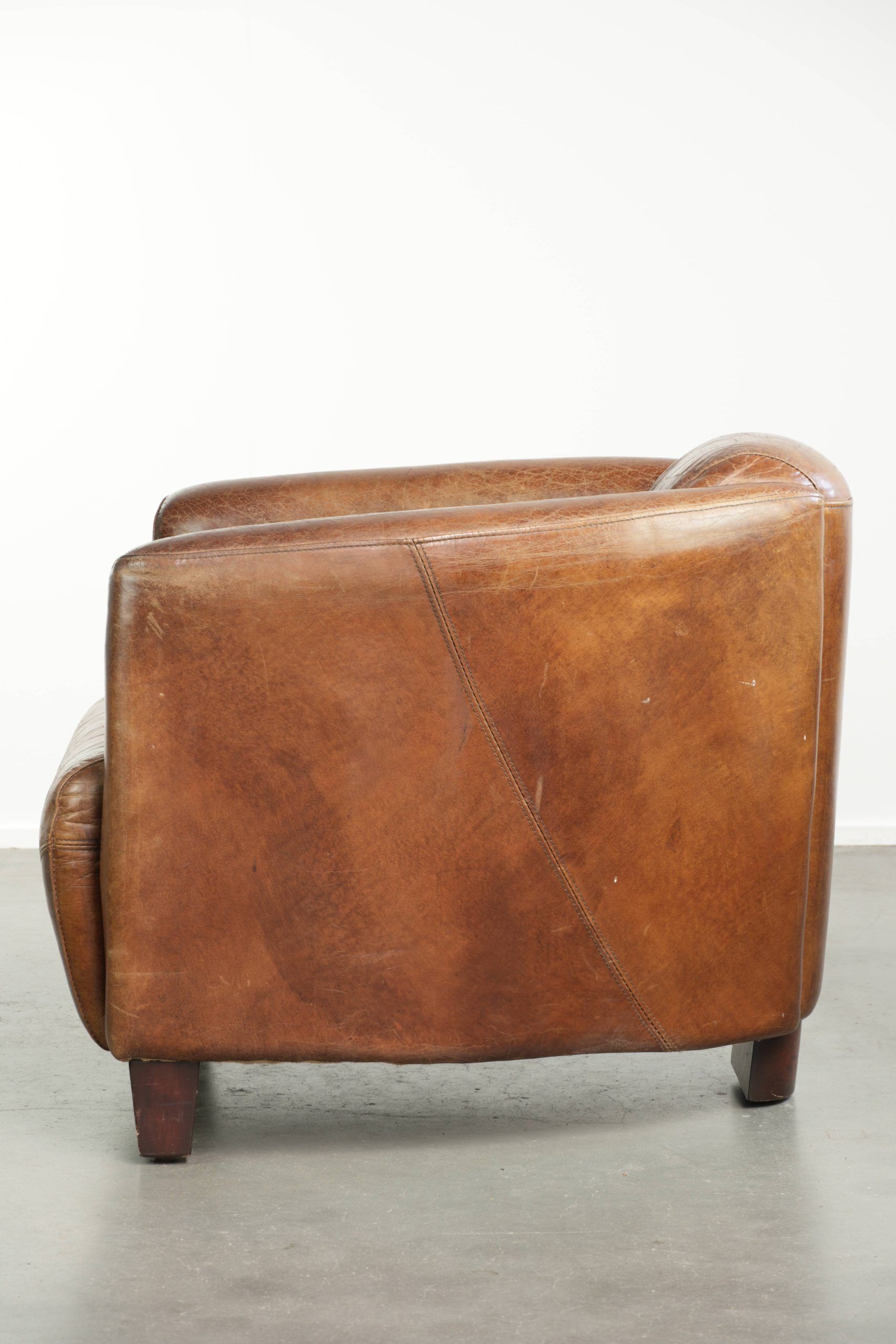 Fauteuil aviateur en cuir de vachette de couleur cognac