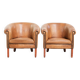 Set of two vintage sheepskin club armchairs with a beautiful light colour