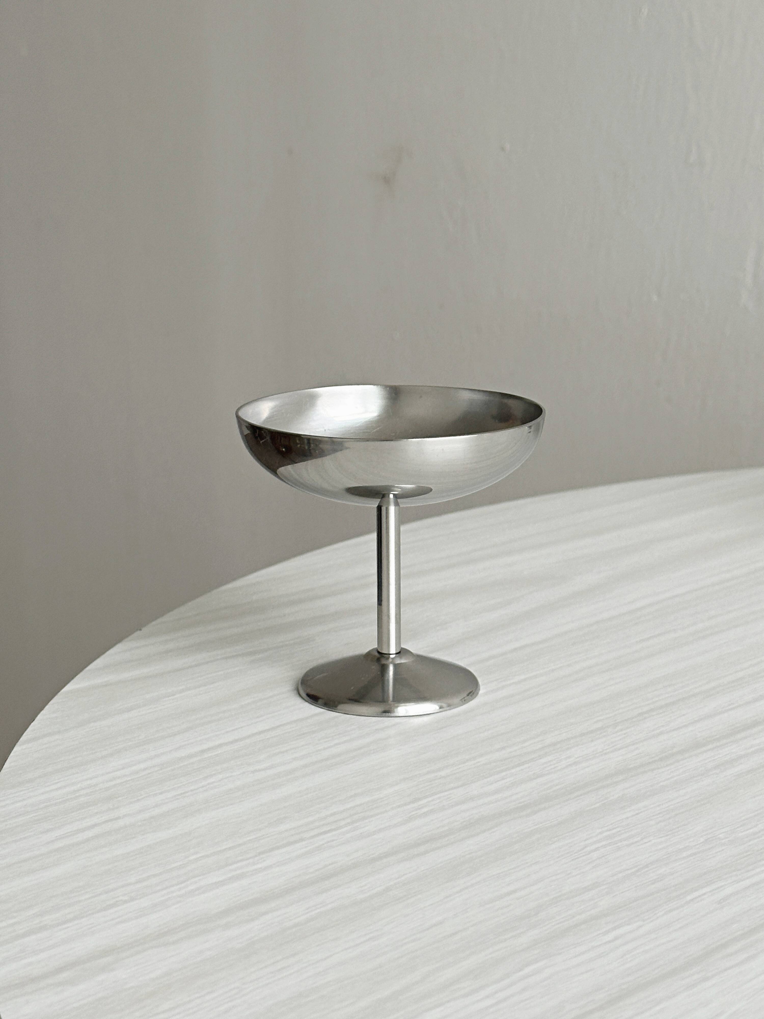 6 metal bowls in the style of Guy Degrenne