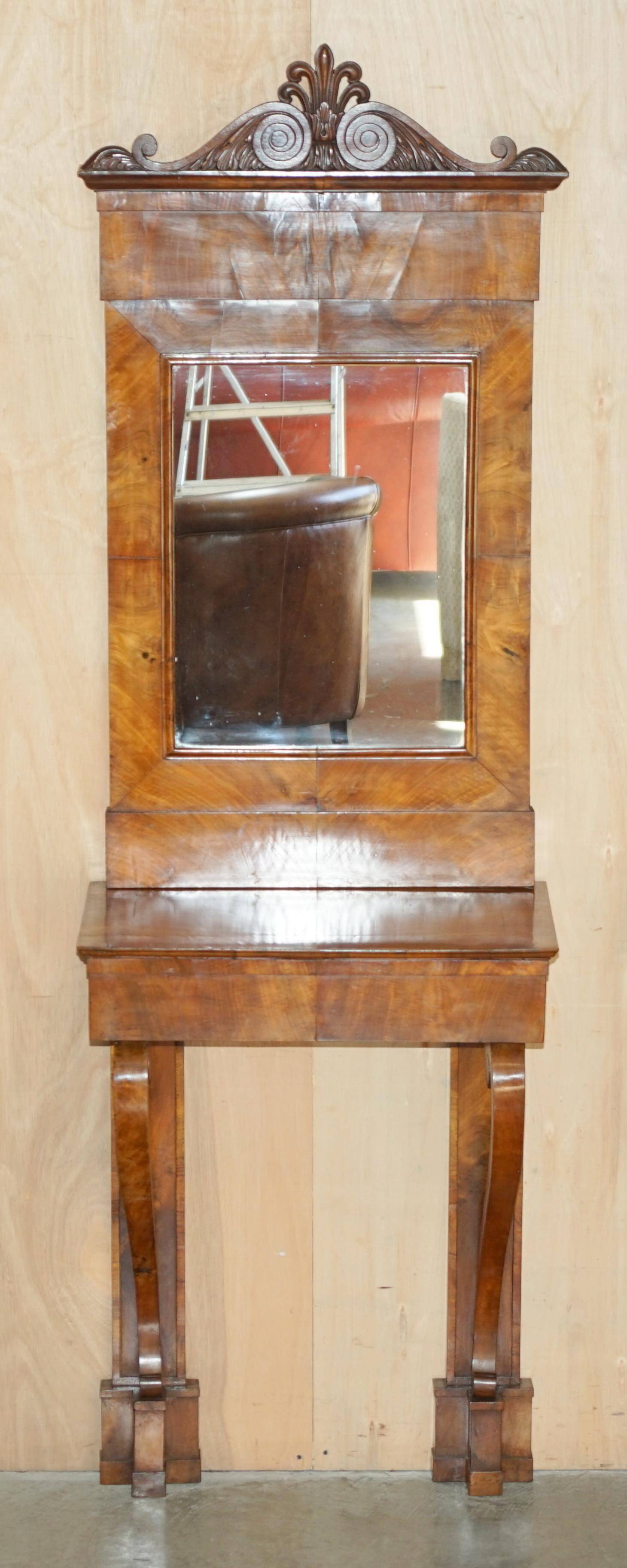 Pair of restored antique consoles from around 1815 in walnut, Regency style with mirror.