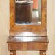 Pair of restored antique consoles from around 1815 in walnut, Regency style with mirror.
