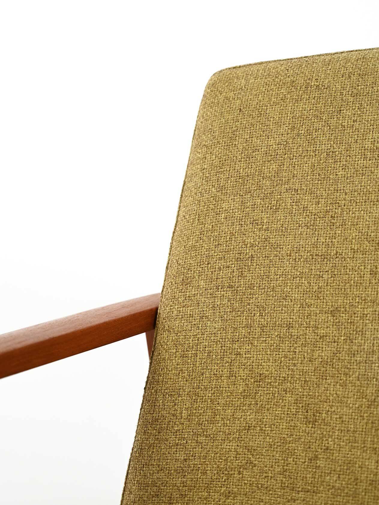 Pair of Danish teak armchairs with green upholstery