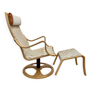 Fauteuil pivotant et - ottoman