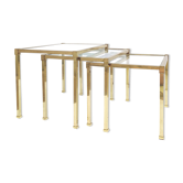 Brass and glass trundle tables