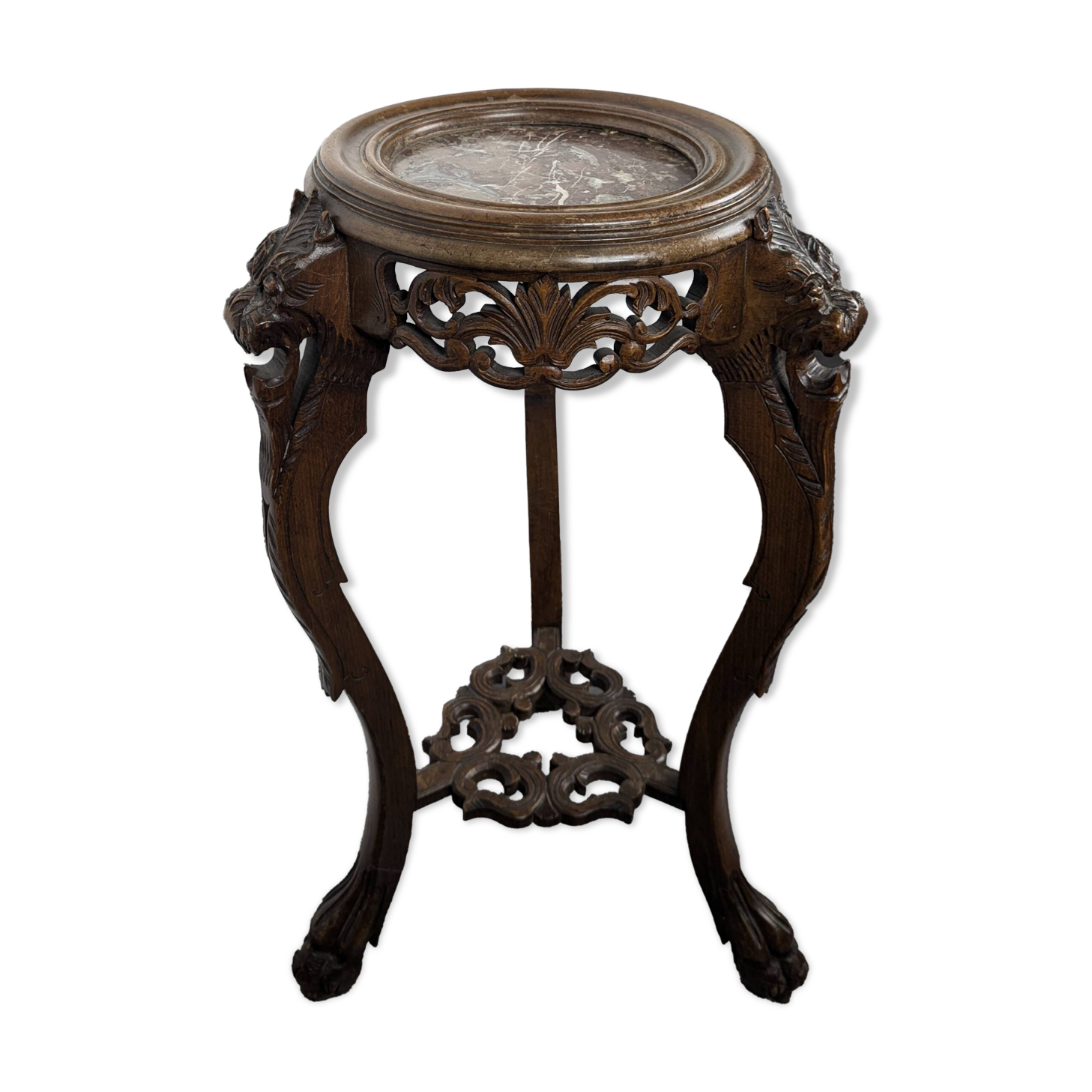 Carved selette with chimera decoration