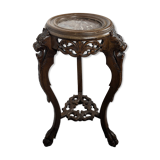 Carved selette with chimera decoration