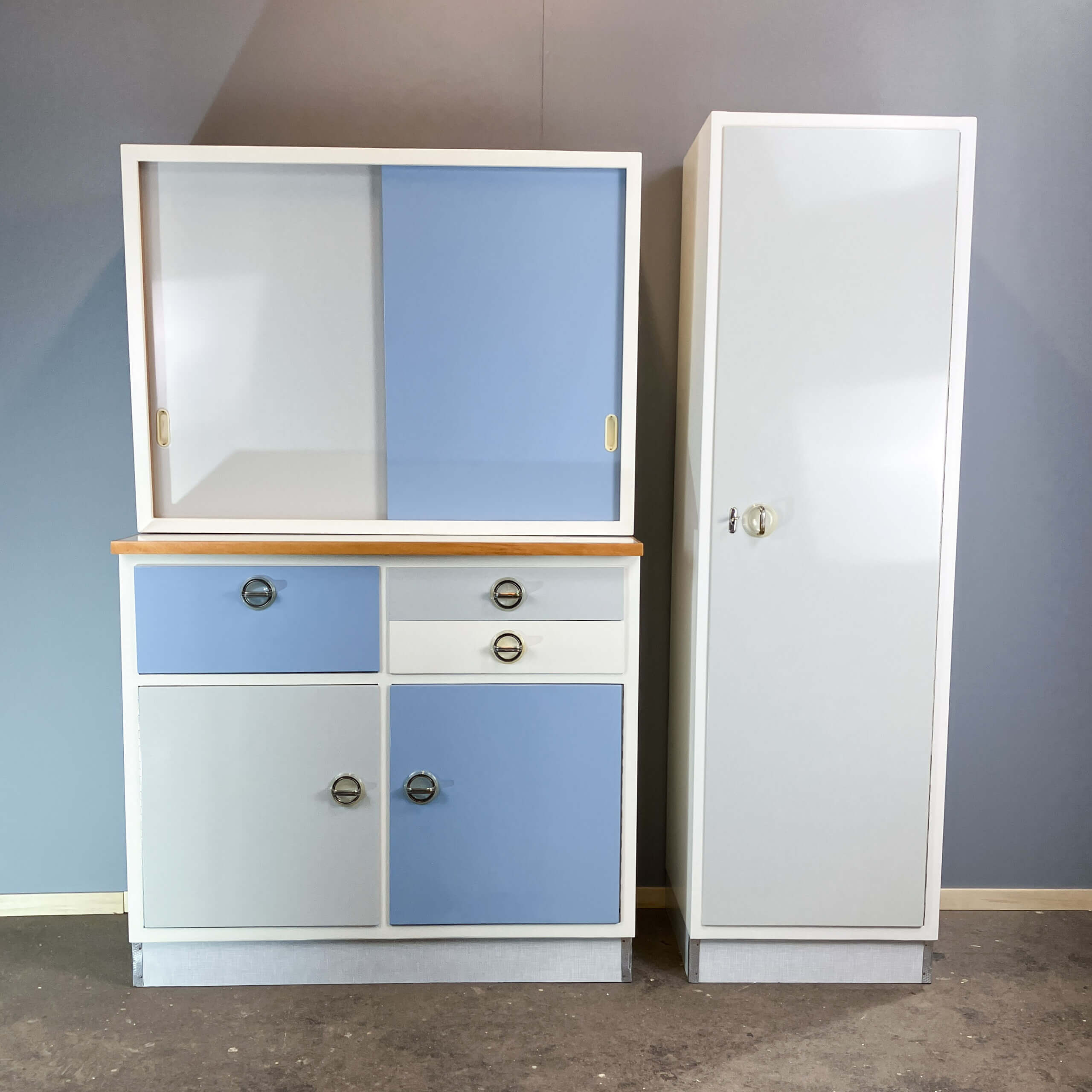 Kitchen cabinets, pastel blue and light gray, vintage from the 60s