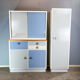 Kitchen cabinets, pastel blue and light gray, vintage from the 60s