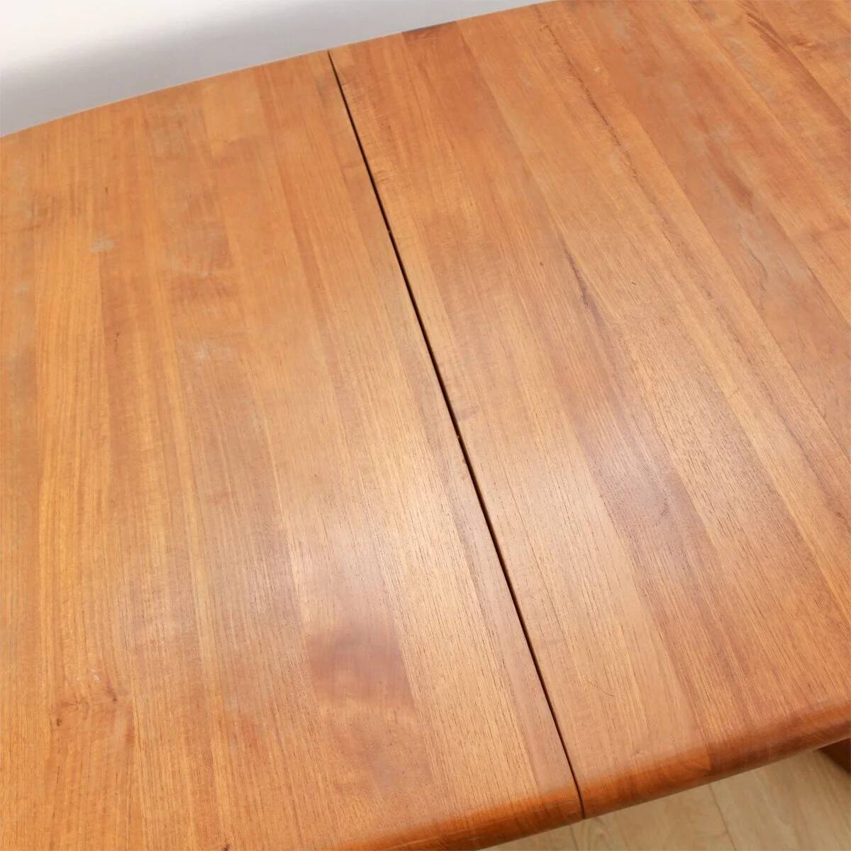 Teak dining table by Dyrlund