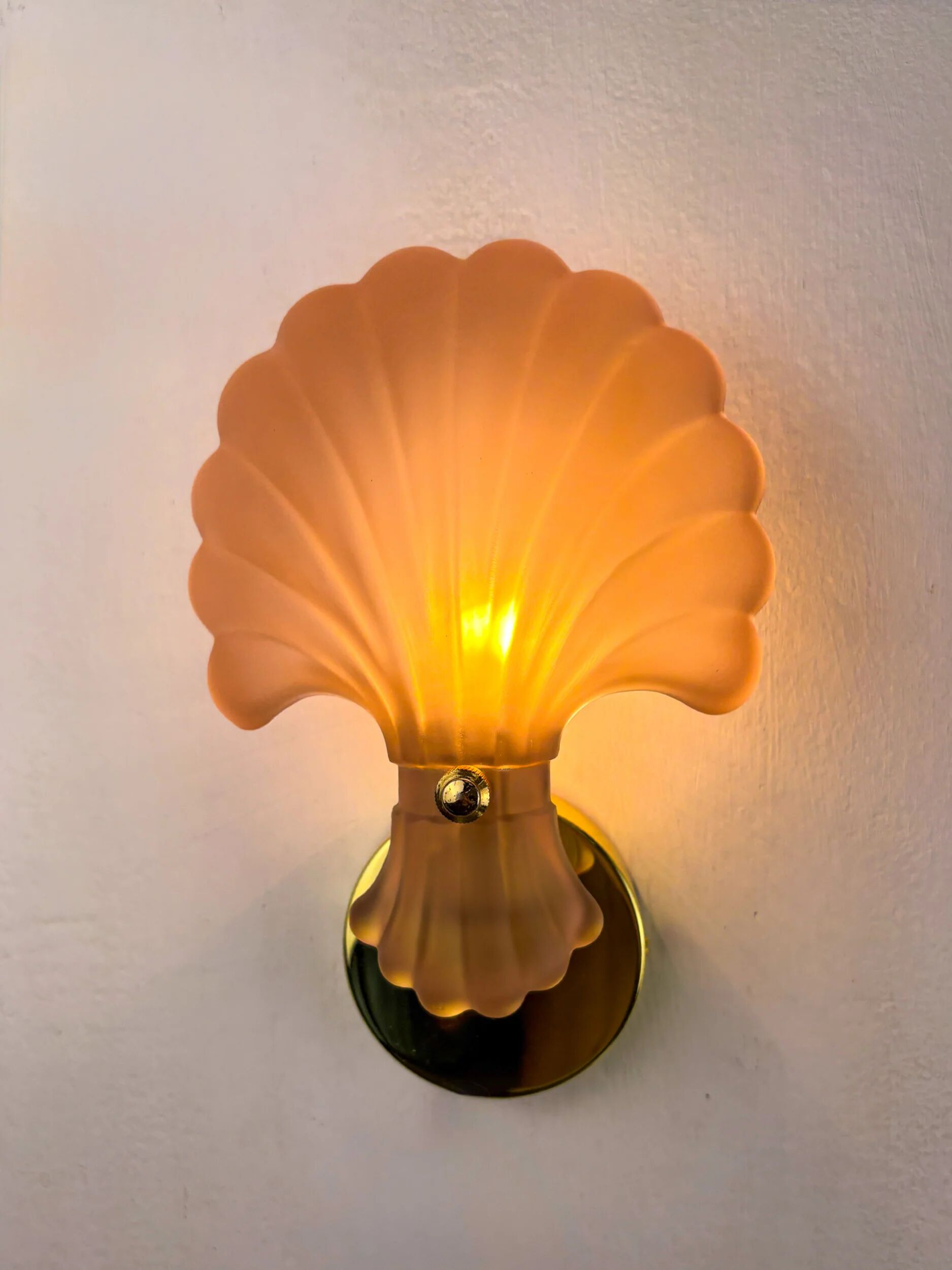 French Art Deco shell wall sconce – amber glass, 1970s