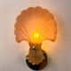 French Art Deco shell wall sconce – amber glass, 1970s