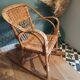 Vintage rattan children's rocking chair