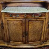 According to Gauthier-Poinsignon: large two-body buffet from the Art Nouveau period in walnut and burl.
