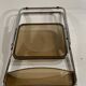 stainless steel and smoked plastic folding chair 70s style