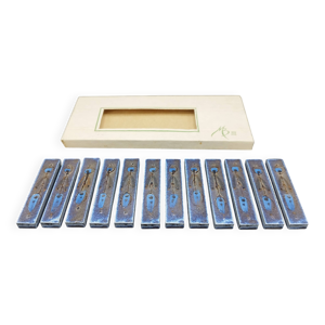 12 porte-couteaux en