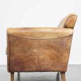 Charming 2-seater designer sofa made of sheep leather with a rustic look