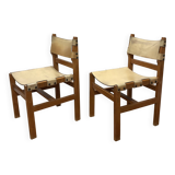 Pair of Maison Regain leather chairs