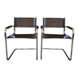 Leather and steel armchairs