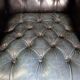 Blue chesterfield barrel back armchair
