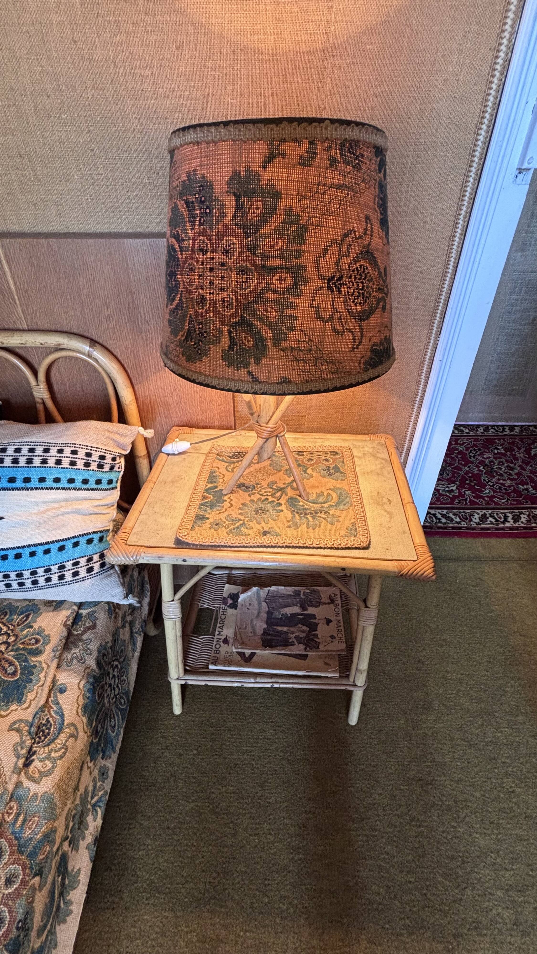 Rattan and bamboo lamp with printed fabric shade.