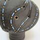 Anthropomorphic candle holder, scarified ceramic, stamped design