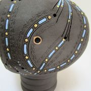 Anthropomorphic candle holder, scarified ceramic, stamped design