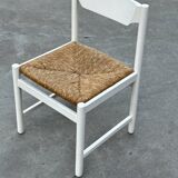 Vintage chair with wicker seat, minimalist design