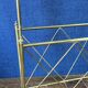 Neoclassical brass magazine rack. Maison Jansen. 1940s.