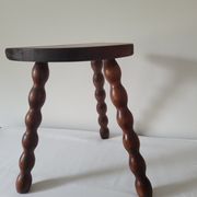 Brutalist stool turned wooden feet