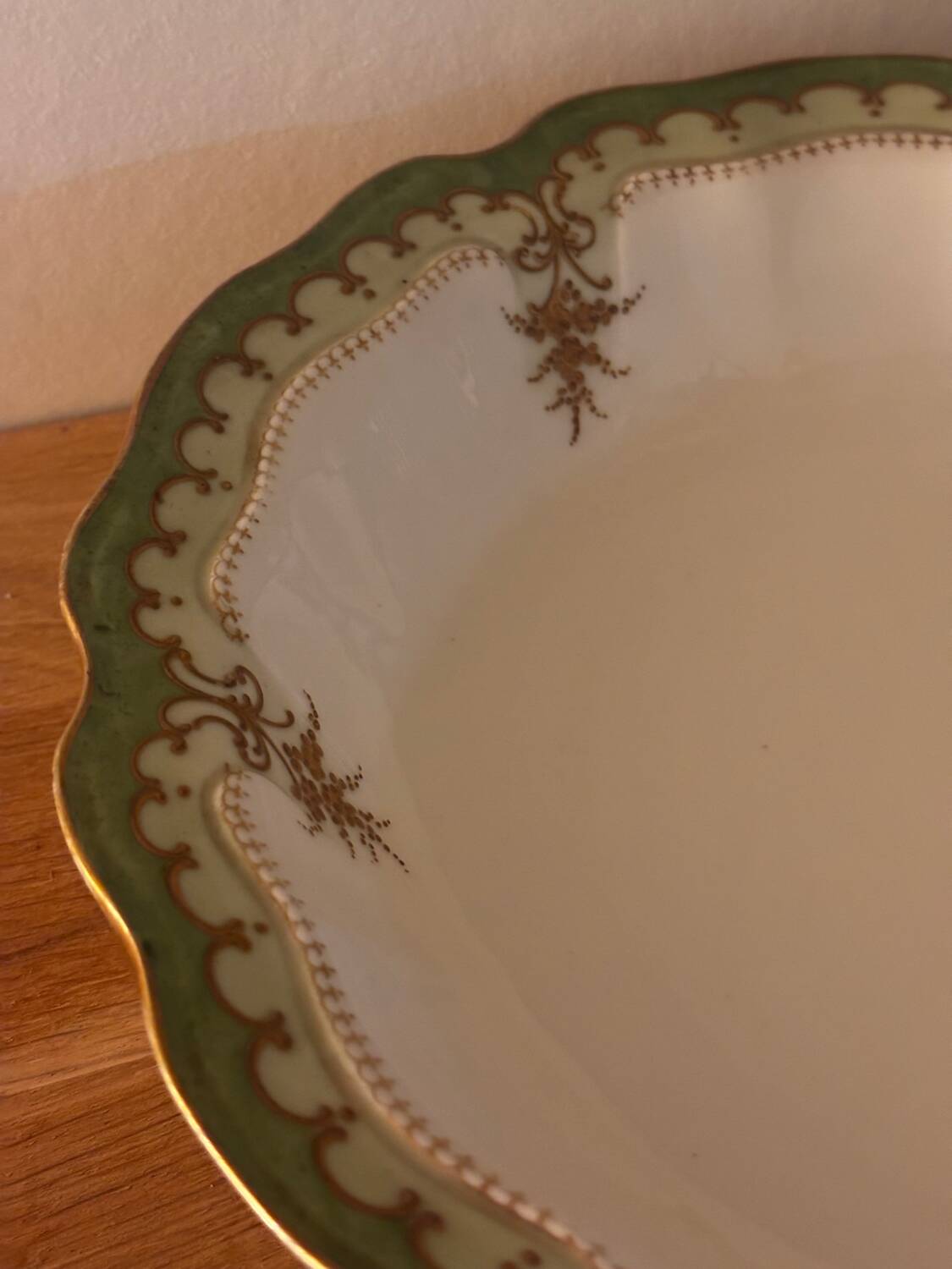 Green Limoges porcelain serving dish with gilt trim