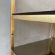 Golden brass and glass shelves