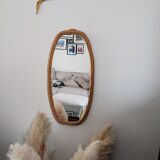 Vintage oval rattan mirror