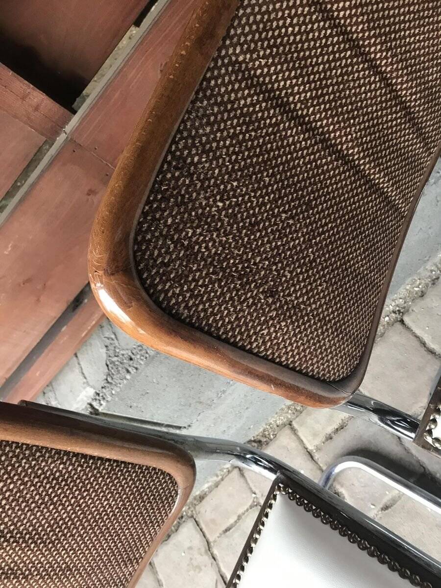 Set of 4 Mid-Century brown faux leather chairs with wood and chrome structure (1970s)