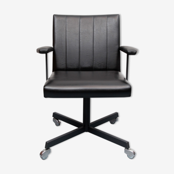 1960s office chair in black synthetic leather