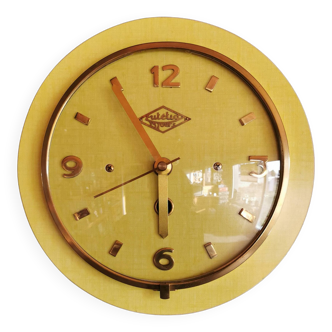 Horloge formica vintage pendule murale silencieuse ronde "Lutetia jaune doré"