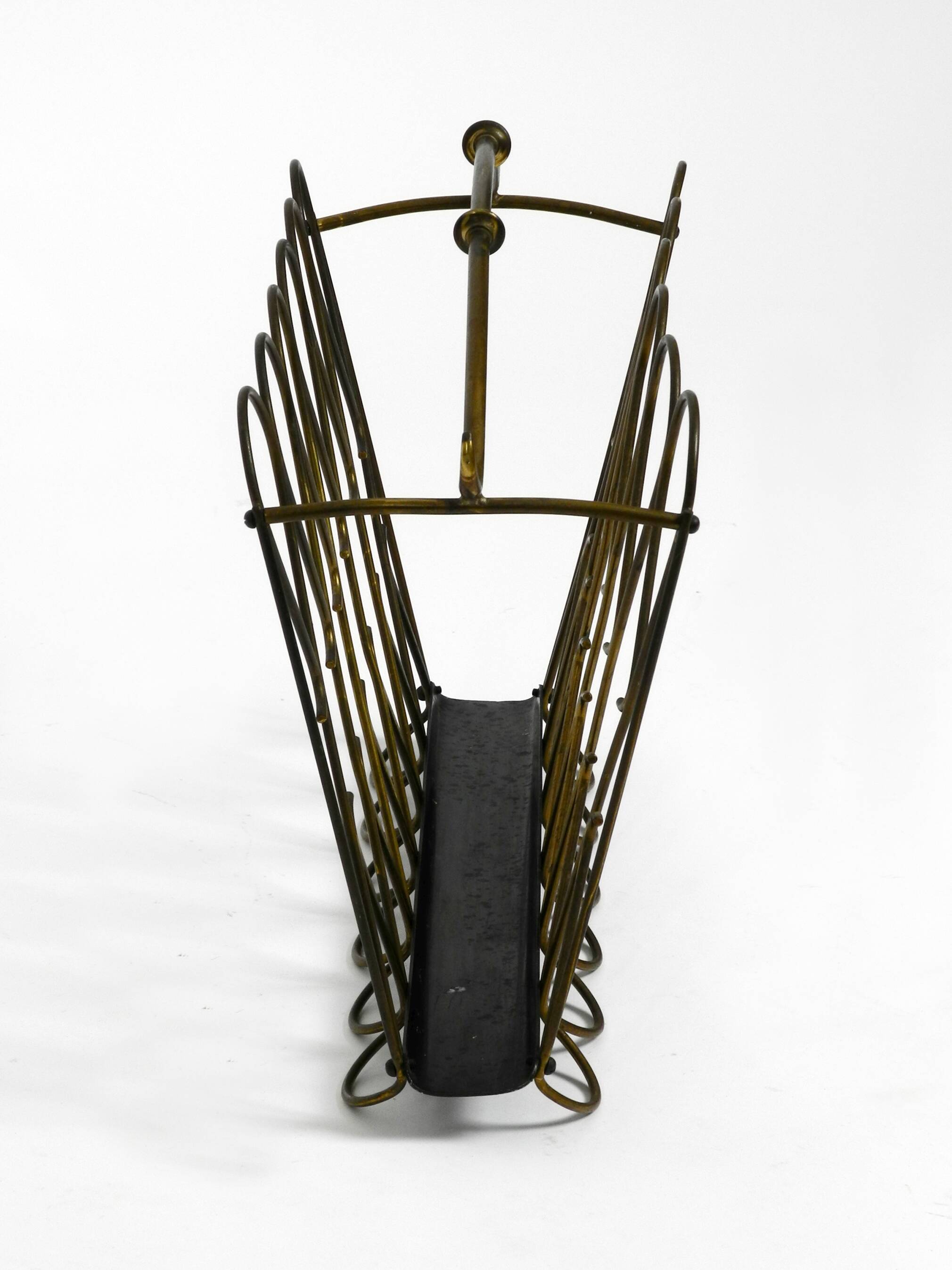 Italian mid century modern newspaper and magazine rack made of brass