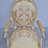 Louis XVI style cabriolet armchair with decorated medallion