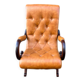 Chesterfield leather slipper chair with mahogany
