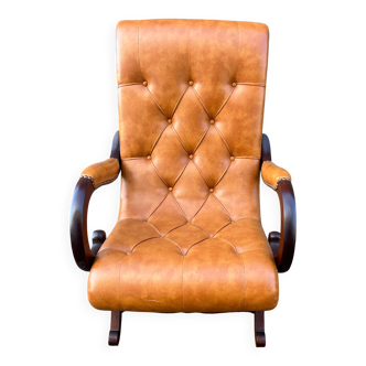 Chesterfield leather slipper chair with mahogany