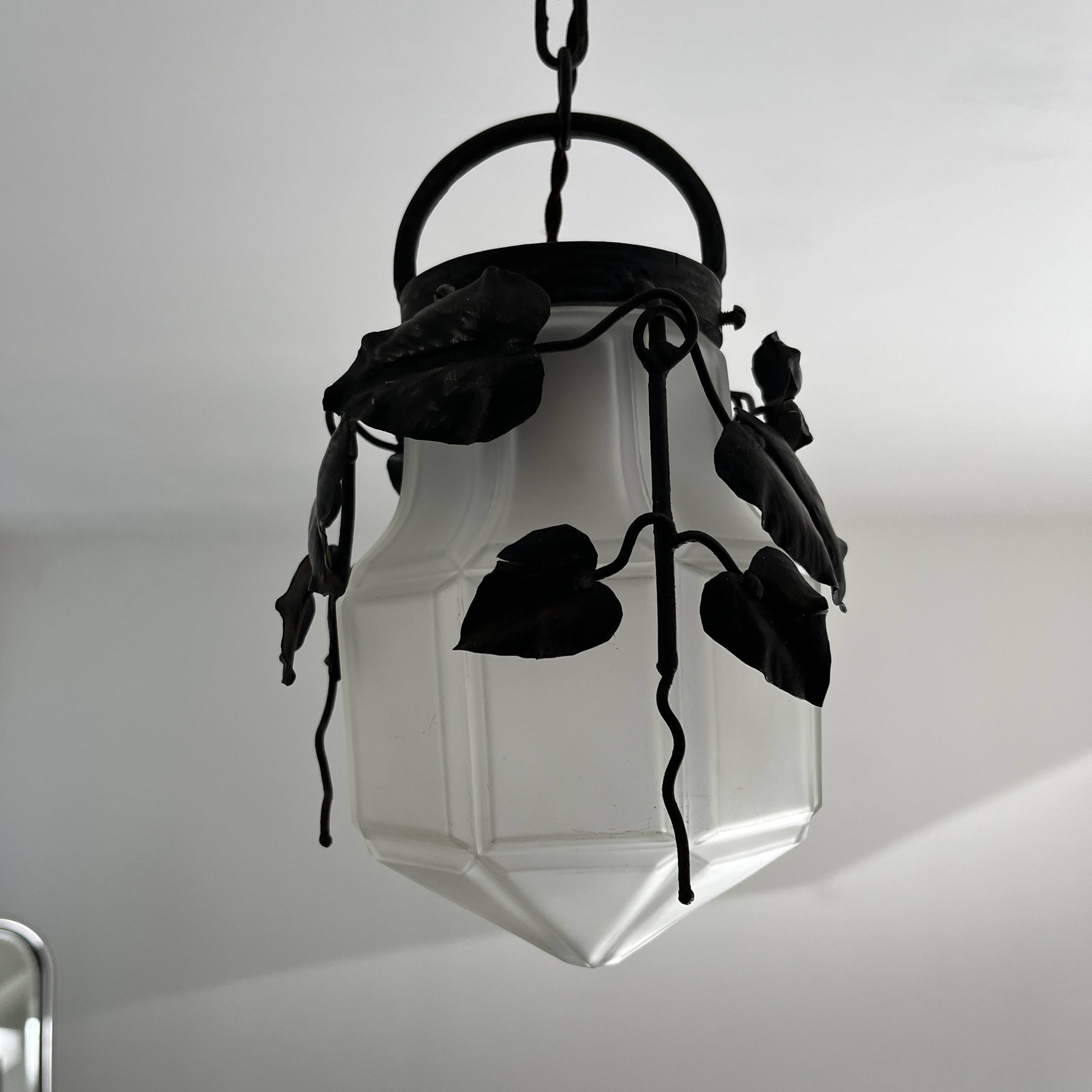 Antique glass and wrought iron pendant light with ivy decor Art Deco chandelier globe