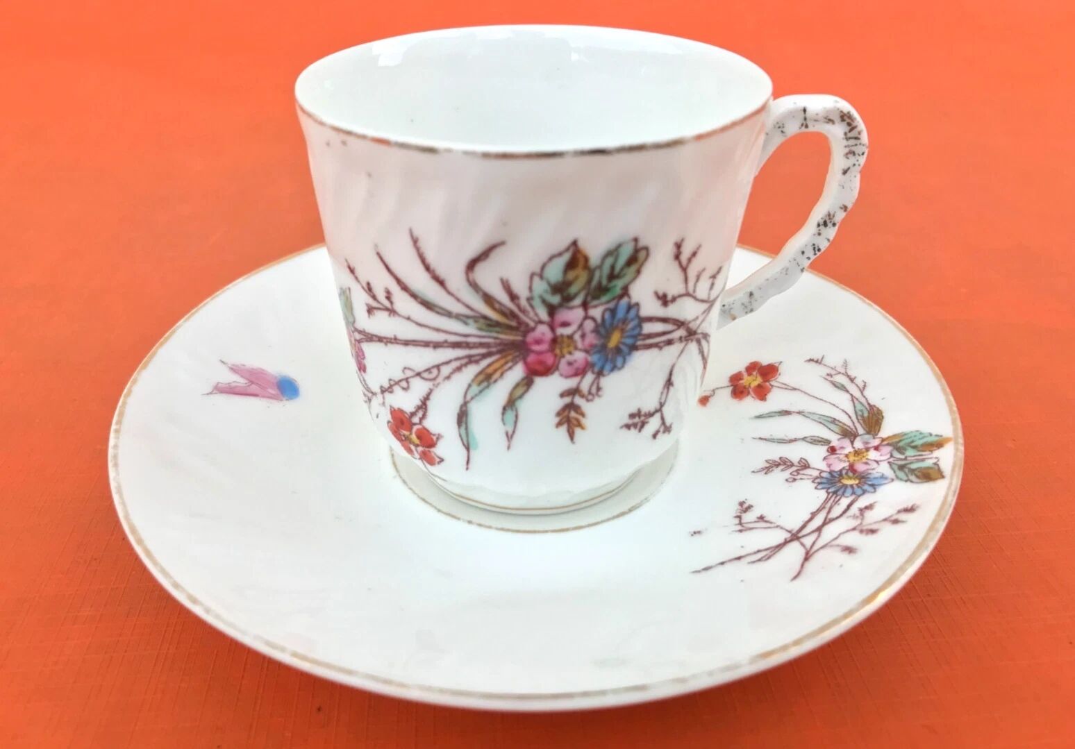 Old coffee cup / saucer in porcelain