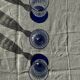 Set of 6 blue-footed champagne flutes; 3 pairs of designs.